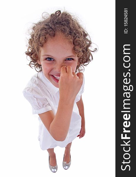 Cute little girl picking her nose over white - wide angle picture