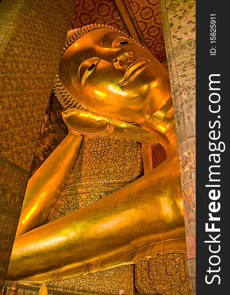 Golden Buddha at  Wat Pho bangkok thailand