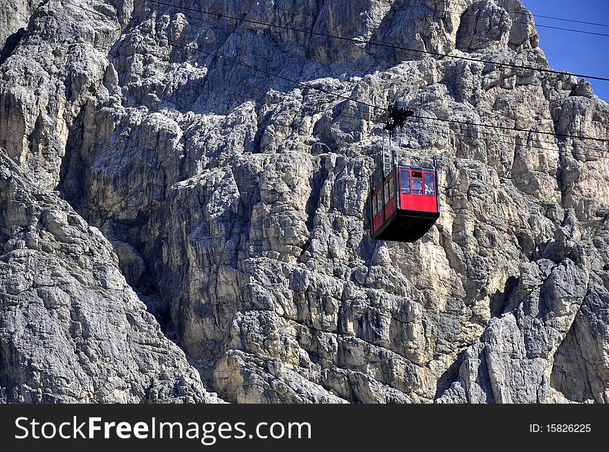 Large passenger lift from the mountain Paso Falzarego Rifugio Lagazuoi - Dolomites, Italy. Large passenger lift from the mountain Paso Falzarego Rifugio Lagazuoi - Dolomites, Italy.