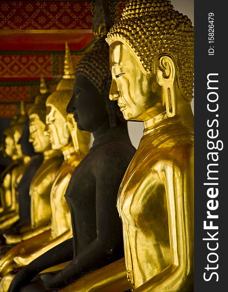 Golden image of Buddha in wat pho ,bangkok thailand