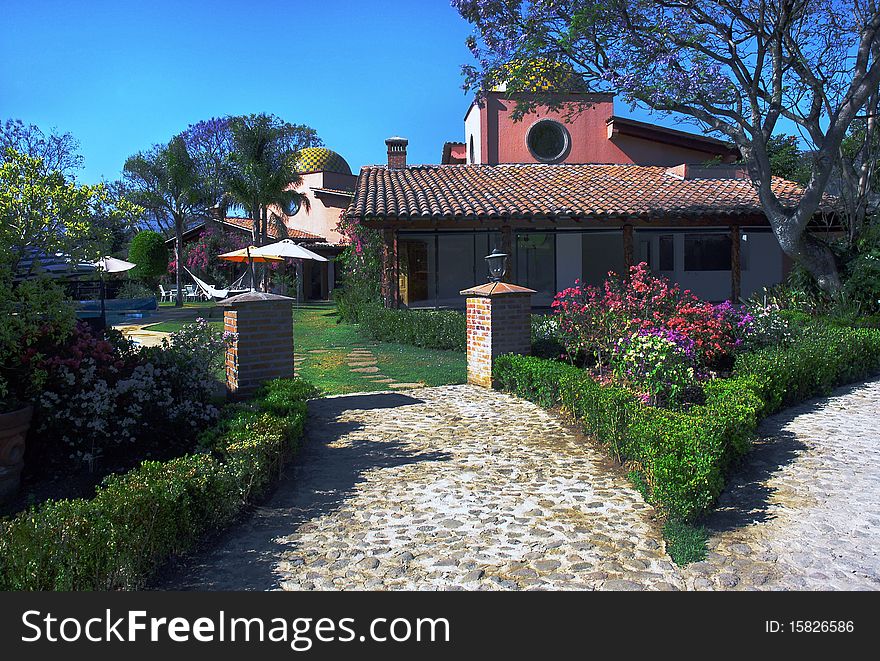 Luxury hotel with garden full of trees and flowers. Luxury hotel with garden full of trees and flowers