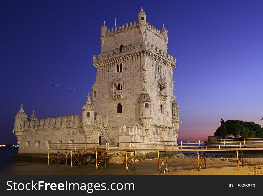 Belem Tower on sunset in blue color