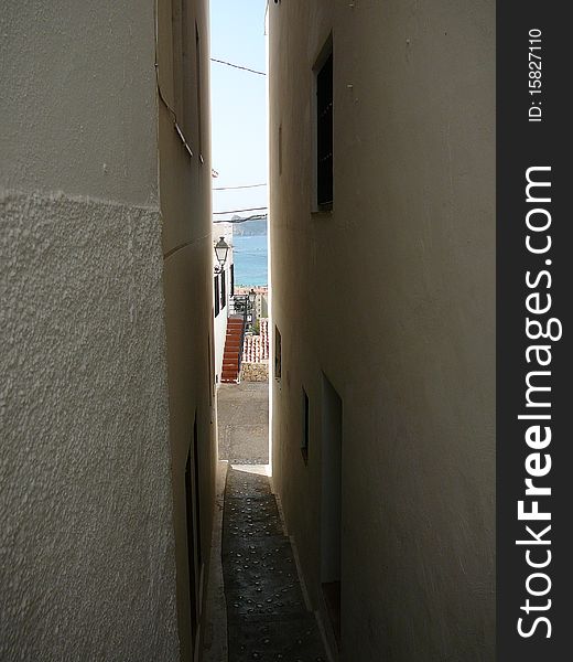 Narrow small street with a view. Narrow small street with a view