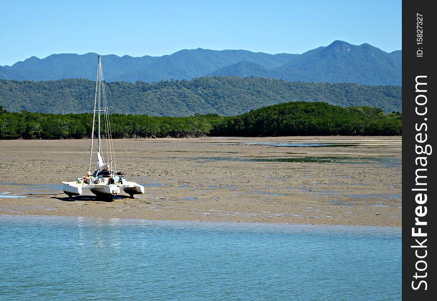 Catamaran on Tidal Mud Flats