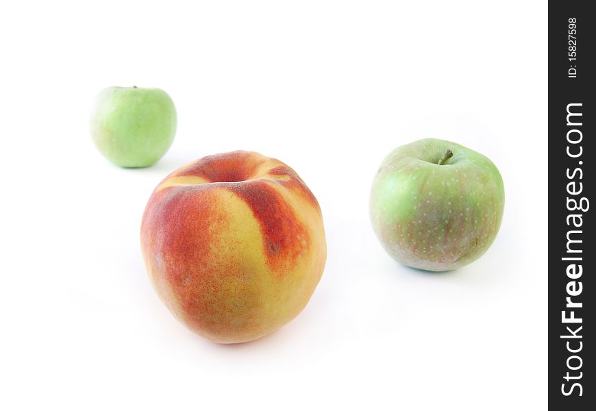 Apples and peach, isolated image