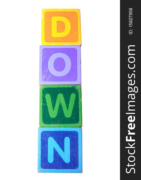 Toy letters that spell down against a white background with clipping path. Toy letters that spell down against a white background with clipping path