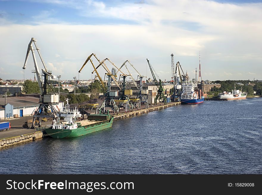 Industrial freight port in the sunshine day. Riga ( Latvia)