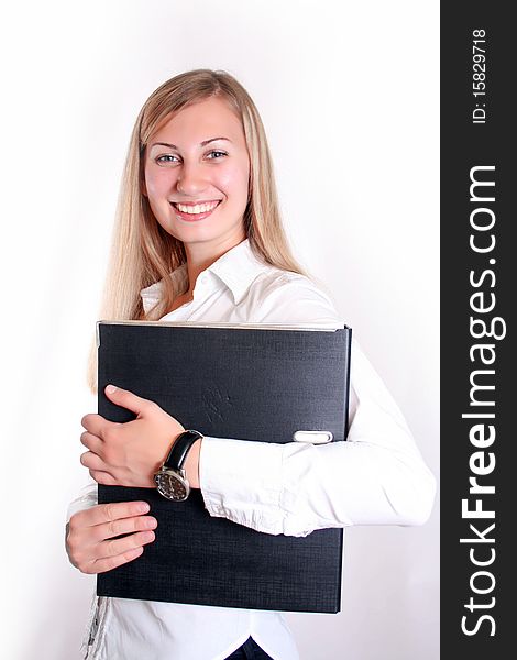 Young smiling business woman working with laptop