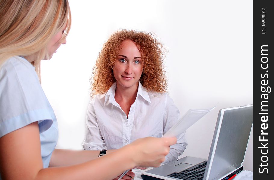 Businesswoman consulting a partner, working office