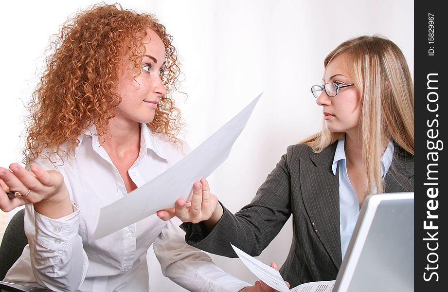 Businesswoman consulting a partner, working office