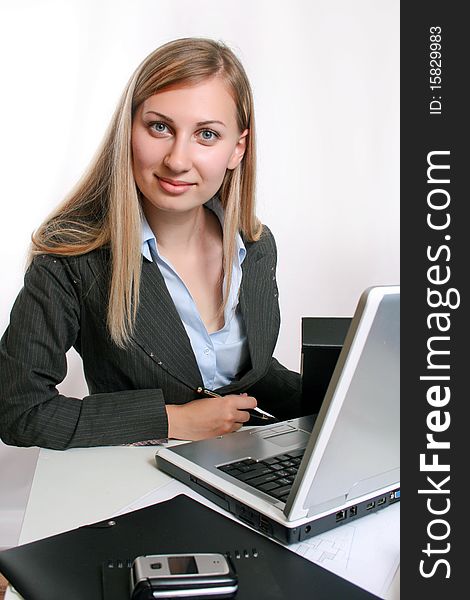 Young smiling business woman working