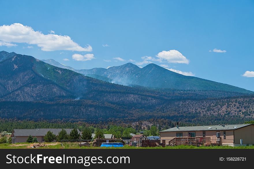 A week after the Schultz Fire began, the wildfire is mostly contained. Clear skies and little smoke provided excellent visibility of the damage to the eastern face of the San Francisco Peaks.