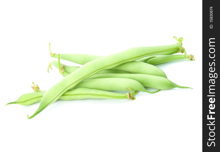 Fresh green peas on a white background