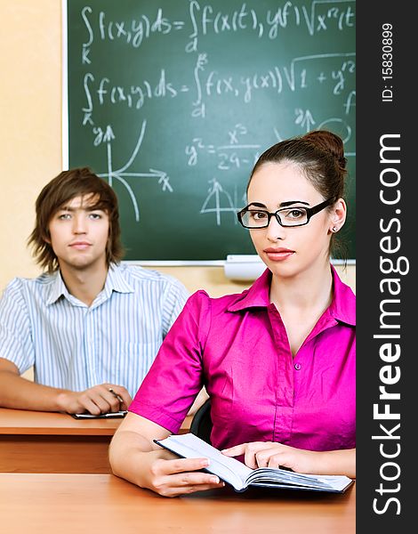 Educational theme: students in a classroom. Educational theme: students in a classroom.