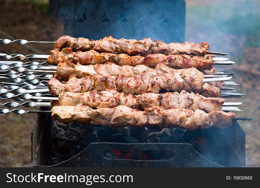 Pork barbeque on the grill. Pork barbeque on the grill