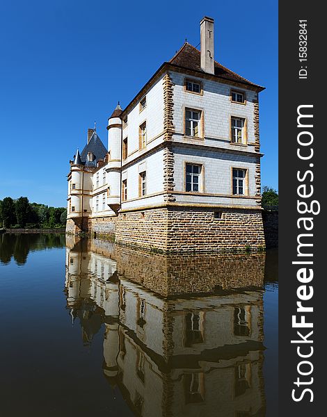 Romantic castle with water in France. Romantic castle with water in France