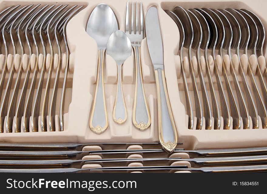 Tableware kit of stainless steel.