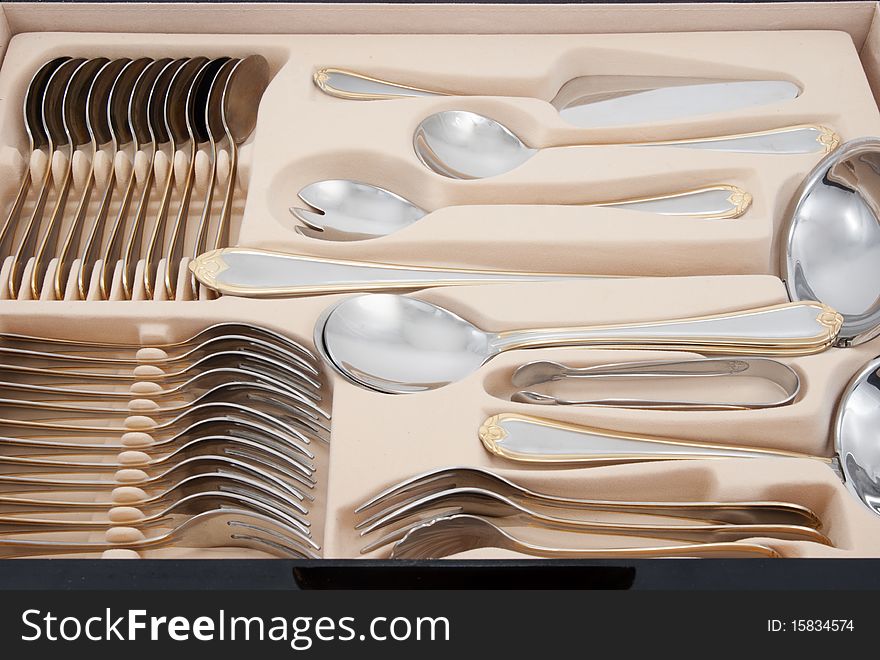 Tableware kit of stainless steel.