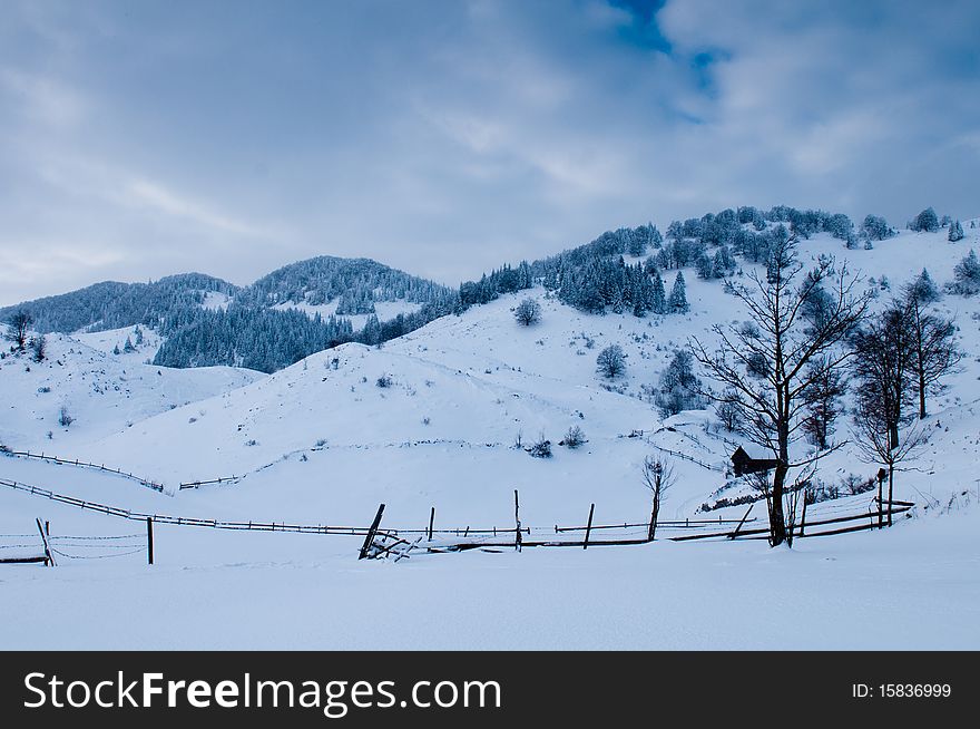 Isolated House in Mountains in Winter