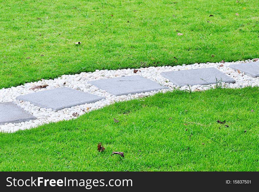 Walk way made by flagstone.