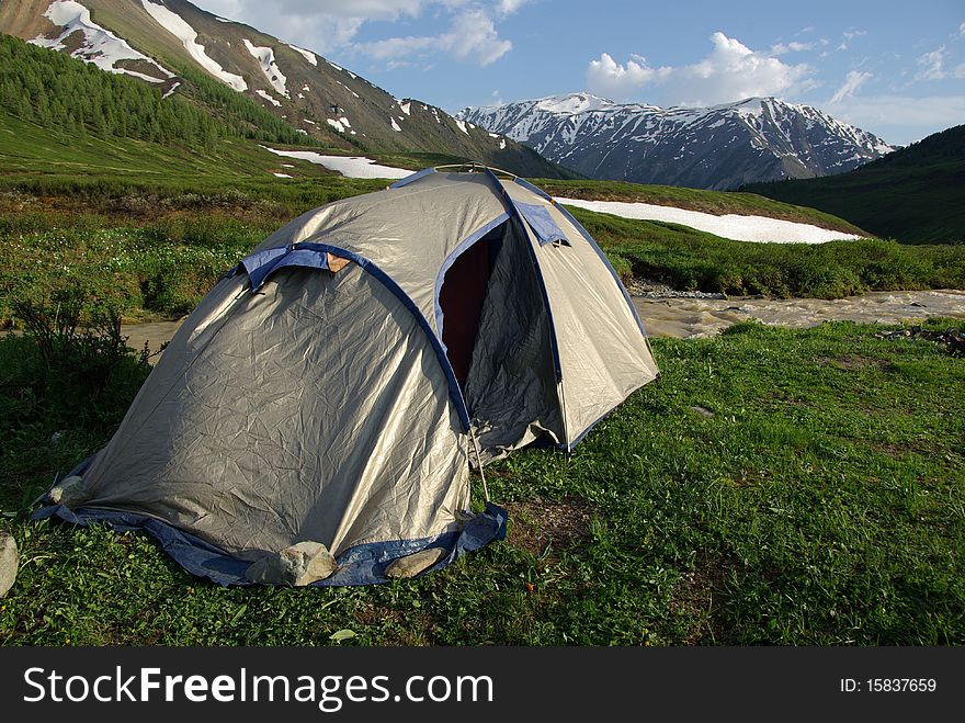 Tourist tent in a mountain landscape