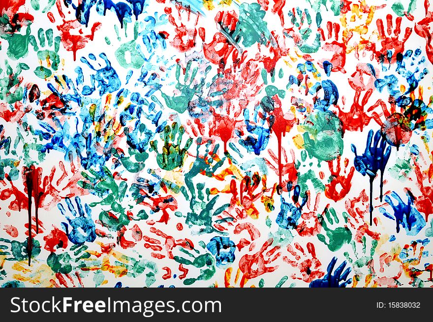 Colorful hand prints on white background