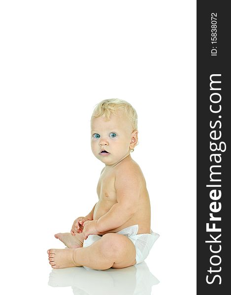 Tow-haired one year baby on white background. Tow-haired one year baby on white background