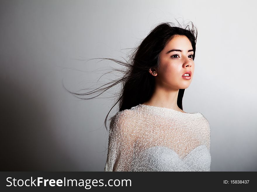 Young Fashion Model With Windswept Hair