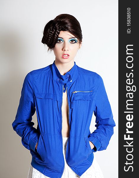 High Fashion Young Woman In A Blue Jacket