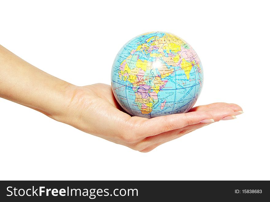 Hand holdings a globe on a white