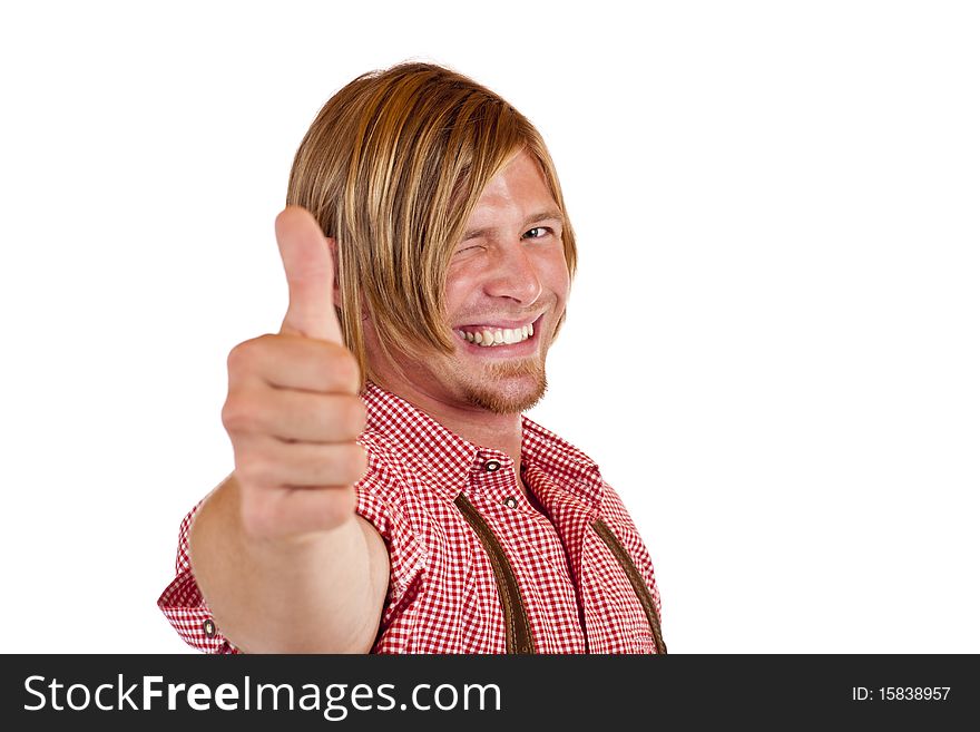 Happy Bavarian man with oktoberfest leather trousers (Lederhose) shows thumb up. Isolated on white background. Happy Bavarian man with oktoberfest leather trousers (Lederhose) shows thumb up. Isolated on white background.