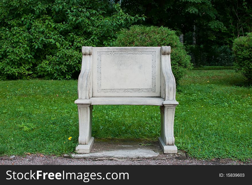 Gray stone chair on the nature backgorund