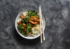 Teriyaki Stir Fry Chicken With Broccoli And Noodles On Dark Background, Top View. Asian Style Food Royalty Free Stock Photos