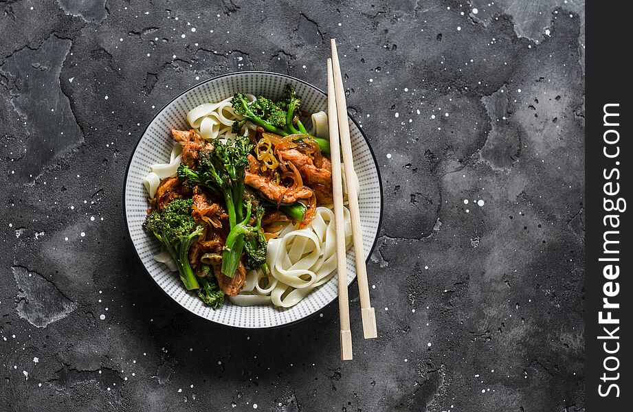 Teriyaki Stir Fry Chicken With Broccoli And Noodles On Dark Background, Top View. Asian Style Food