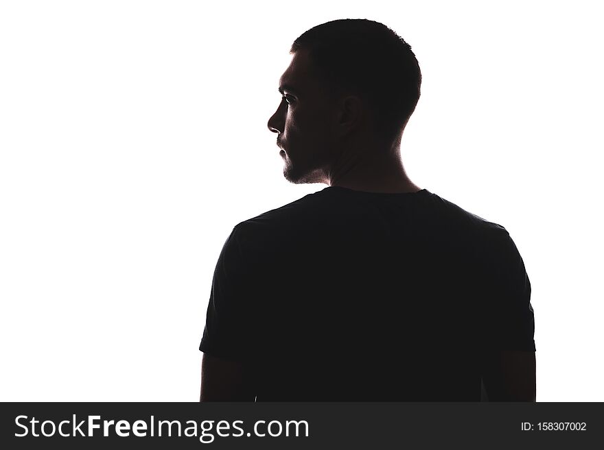 Silhouette portrait of man with his back looking away, isolated on a white background