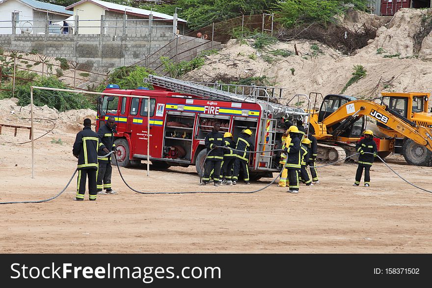 Somali firemen demonstrate their newly learned skills during an excercise attended by the Mayor of Mogadishu, Mohamed Nur, and AMISOM&#x27;s Contingent Commander, Brigadier General Michael Ondoga, in Mogadishu on July 6. AU UN IST PHOTO / ABDI IYE. Somali firemen demonstrate their newly learned skills during an excercise attended by the Mayor of Mogadishu, Mohamed Nur, and AMISOM&#x27;s Contingent Commander, Brigadier General Michael Ondoga, in Mogadishu on July 6. AU UN IST PHOTO / ABDI IYE