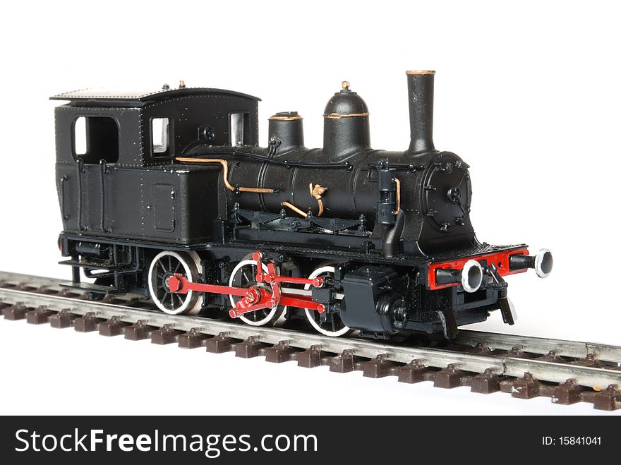 Vintage black model railway isolated on white background. Vintage black model railway isolated on white background