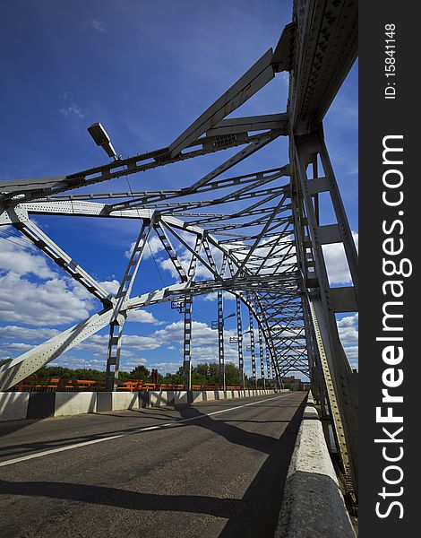 Metal bridge and sky  with clouds. Metal bridge and sky  with clouds