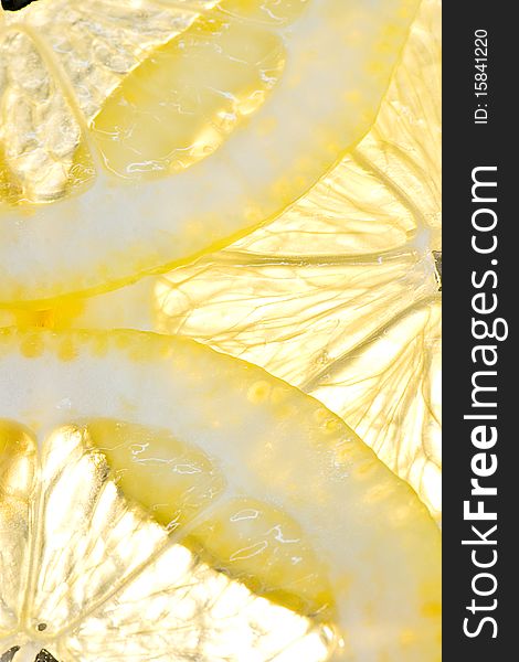 Background from several slices of a lemon. Background from several slices of a lemon