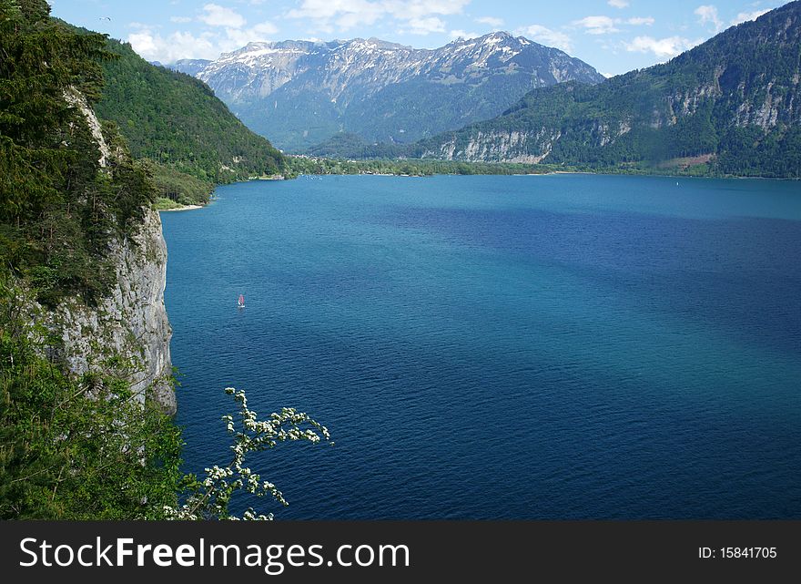 A view on the southern end of Lake Thun, Switzerland with the town of Interlaken in the distance.