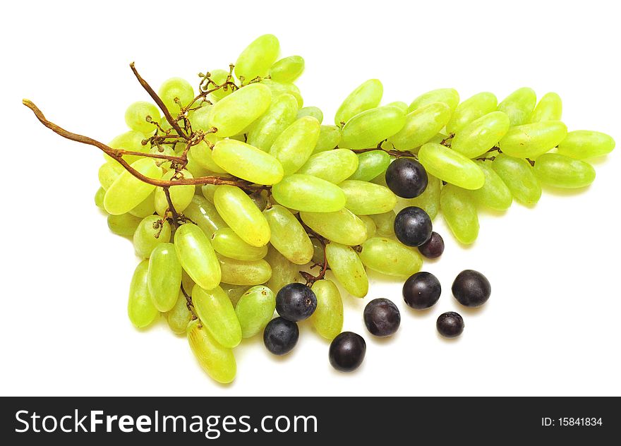 Colorful ripe grapes  on a white background
