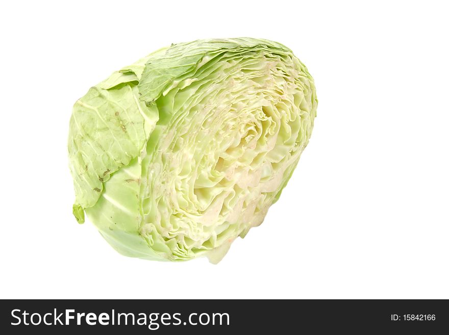 Cut half of Fresh Green cabbage isolated on White