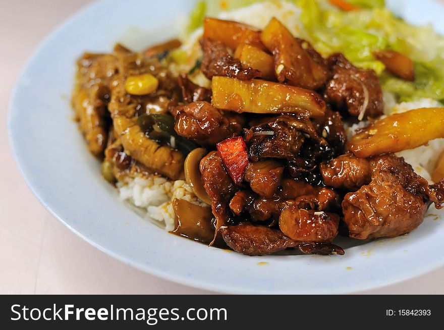 Vegetarian sweet and sour pork set meal. Suitable for concepts such as diet and nutrition, healthy lifestyle, and food and beverage.