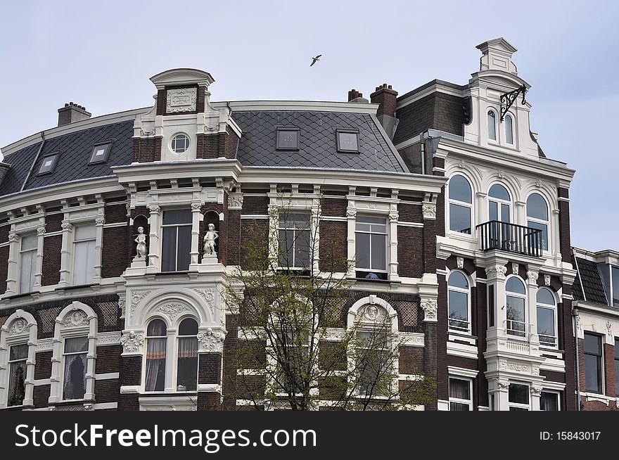 This is Amsterdam building, wiew from the channel, tourism, Europe, Amsterdam. This is Amsterdam building, wiew from the channel, tourism, Europe, Amsterdam