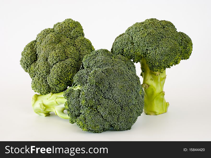 Fresh green sprouting broccoli on the white background. Fresh green sprouting broccoli on the white background