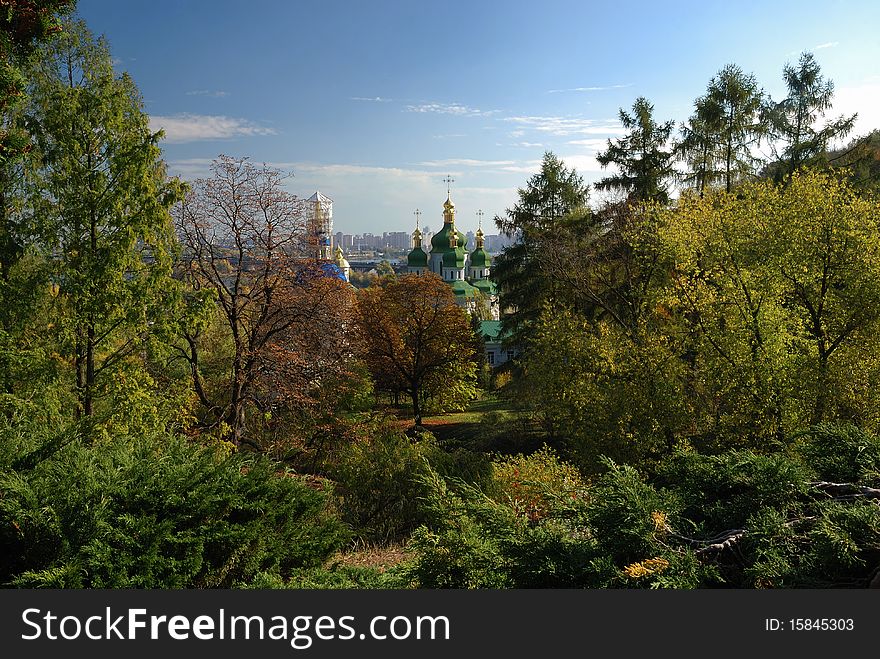 Vydubetsky monastery is in the middle of autumn park. Vydubetsky monastery is in the middle of autumn park.