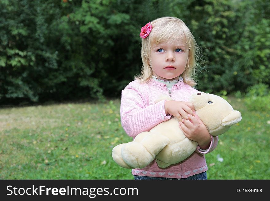 Baby Girl Holding Her Toy Bear