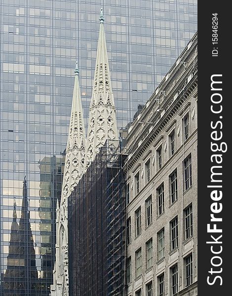 St. Patrick's Cathedral contrast with modern skyscraper in New York City