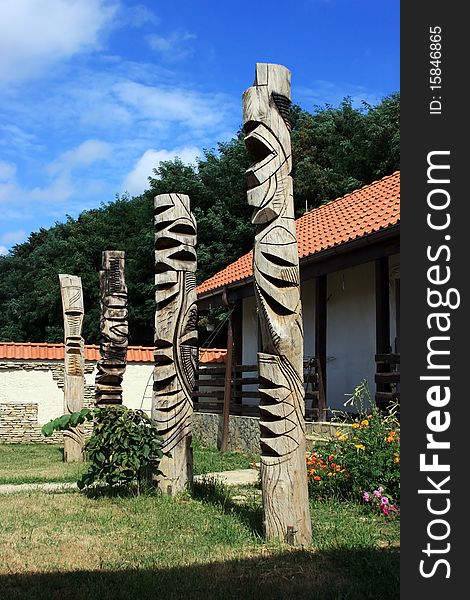 This image represents a series of four tribal sculptures in wood very well preserved