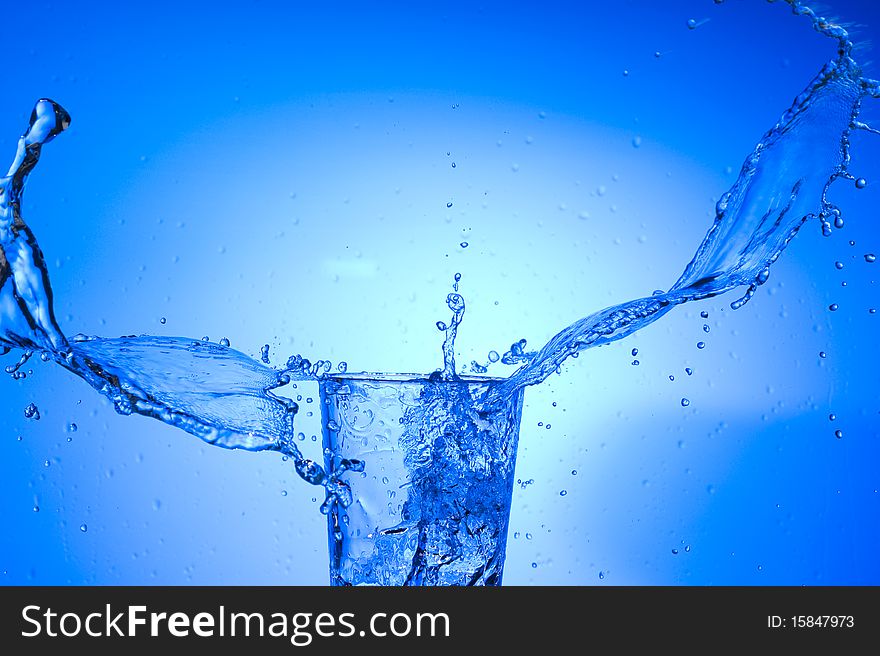 Fresh  spray water on blue background